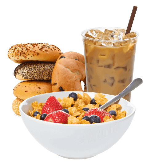 A bowl of cereal, fruit and coffee with donuts.